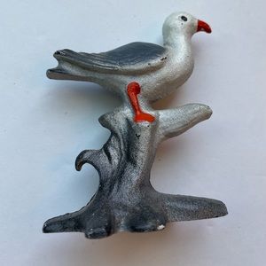 Vintage cast iron sea gull bottle opener.